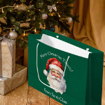 Custom Green From Santa Claus Kids Christmas Large Gift Bag<br><div class="desc">Customise this nostalgic from Santa Claus green gift bag with your own personalised text with your kids name in white script. This beautiful old fashioned drawing of Santa's red hat and white beard are the perfect holiday stickers for your children's presents under the tree on Christmas day.</div>