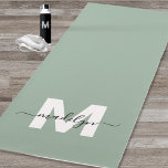 Custom Initial Name Monogram Sage Green Yoga Mat<br><div class="desc">Create Your Own Personalised Modern Bold Script Name Monogram Sage Green and White Double-Sided Yoga Mat. This chic, luxury yoga mat features a stylish monogram design with a soft sage green background and a bold white initial, overlaid with a flowing black script name for a personal touch. Designed for both...</div>