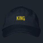 Custom KING Embroidered Adjustable Navy-Hat Style Hat<br><div class="desc">Elevate your casual wardrobe with the Custom KING Text Printed Adjustable Cap. Featuring striking "KING" embroidery in bold lettering,  this navy cap combines style and comfort. The adjustable strap ensures a snug,  personalised fit for all-day wear.</div>