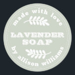 Custom Lavender Soap Pastel Green Classic Round Sticker<br><div class="desc">Rustic and modern lavender soap sticker with the text made with love, lavender soap and your name in stylish white retro typography on a pastel green background with a stylish touch of foliage and a vintage feel. Simply add your name and the product name to the label. Exclusively designed for...</div>