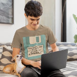 Custom Message Computer Floppy Disc T-Shirt<br><div class="desc">Remember floppy discs? This t-shirt is a blast from the past with it's illustration of a light blue computer floppy disc. Use the template fields to easily add your own message to the disc's label area. This tee shirt coordinates with other items in our Old Tech collection from Asterisk Designs....</div>