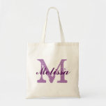 Custom Monogram Name Purple Tote Bag<br><div class="desc">Custom Monogram Name Purple Tote Bag. Elegant monogram logo design with monogrammed letter initials in a grunge font and name in dark purple script font. Easily replace the template monogram initials and the name with your own.Cute gift idea for all at a wedding specially for bride and bridesmaids or close...</div>