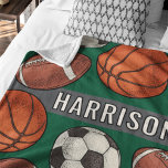 Custom Monogrammed Green Sports Fleece Blanket<br><div class="desc">Perfect for athletes of all ages and families for sporting events. Stay warm at chilly football, soccer, hockey and basketball sports games and cuddle up on the couch with this custom monogrammed multi sport patterned fleece blanket. Includes a cool and unique illustrated border pattern of sports balls and hockey pucks...</div>