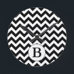 Custom Monogrammed Large Black Chevron Design Round Clock<br><div class="desc">This product features a classic large black and white chevron  zig-zag design with a personalised monogram initial. You can customise the initial or add your own text on the product order page.</div>