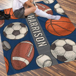 Custom Monogrammed Navy Blue Sports Fleece Blanket<br><div class="desc">Perfect for athletes of all ages and families for sporting events. Stay warm at chilly football, soccer, hockey and basketball sports games and cuddle up on the couch with this custom monogrammed multi sport patterned fleece blanket. Includes a cool and unique illustrated border pattern of sports balls and hockey pucks...</div>