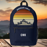 Custom Mountain Sunset Navy Blue Hiking Printed Backpack<br><div class="desc">This cool orange vintage sunset over rocky mountains in nature makes a great image on a cute retro navy blue backpack for a mountain hiking trip or camping vacation for a family who loves to spend time outdoors and the wilderness. Monogram with your name on the pocket.</div>