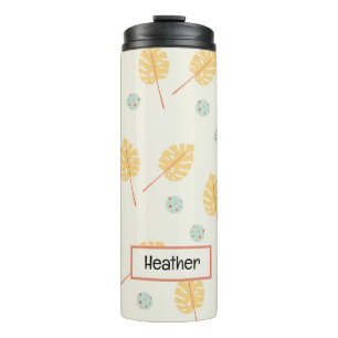 Custom name orange tropical leaves cream thermal tumbler