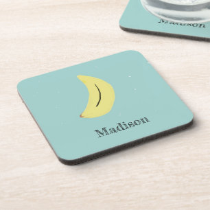 Custom name painted banana on blue coaster