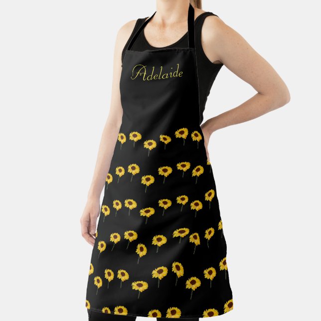 Custom name yellow sunflowers on black apron (Insitu)