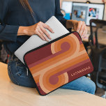 Custom Orange Dark Maroon Red Retro Art Pattern Laptop Sleeve<br><div class="desc">Beautiful contemporary red, dark, and light-coloured orange coloured geometric circles and lines pattern on a maroon background. With room to customise or personalise with a name, monogram, or initials of your choice. Ornate, elegant, and funky hipster design for the artistic artsy fashion diva, popular hip trendsetter, vintage retro, nouveau deco...</div>