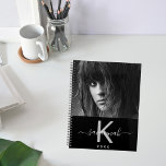 Custom photo black white monogram 2025 planner<br><div class="desc">A chic black background. Personalise and add your own photo, a name, monogram letter and a year. The name is written in white with a large modern hand lettered style script with swashes. The monogram letter in grey. Perfect for school, work or organising your personal/family life. To keep the swashes...</div>
