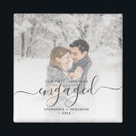 Custom Photo First Christmas Engaged Gray Script Magnet<br><div class="desc">Commemorate your engagement with this modern keepsake magnet. The gray text reads "Our first Christmas engaged, " with the word "engaged" in whimsical handwriting script with flourishes before and after. Replace the sample image with your favorite photo, and add your names and the year. A white gradient filter helps make...</div>
