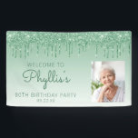 Custom Photo Green Glitter Drip 80th Birthday Banner<br><div class="desc">Welcome guests with this chic, glamourous 80th birthday party photo banner, featuring a sparkly green faux glitter drip border and green ombre background. Easily replace the sample image with a photo of the guest of honour. Personalise it with her name in green handwriting script, with the birthday and date below...</div>