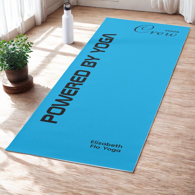 Custom Print Yoga Crew Azure Blue Yoga Mat (Blue yoga mat on studio floor.)