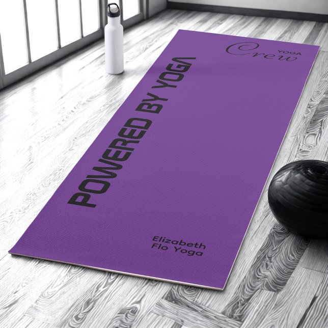 Custom Print Yoga Crew Royal Purple Yoga Mat (Royal purple yoga mat on a studio floor.)