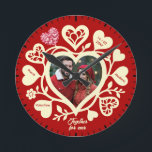 Custom Red Cream Photo Heart Clock<br><div class="desc">This heartwarming wall clock is special because it transforms a standard timepiece into a cherished romantic keepsake by featuring your favourite couple's photo at the heart of the design. Set against a bold crimson background with soft cream decorative hearts and customisable names, it tells a unique story of love and...</div>