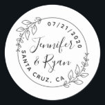 Custom Round Laurel Wreath Wedding Save The Date Classic Round Sticker<br><div class="desc">Create your own unique thank you favors for all your family and friends that joined you on your special day! Add your names, your wedding date, and your wedding location and see your thank you stickers come to life! This design features a simple round frame with two laurel wreath sprigs...</div>