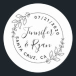Custom Round Laurel Wreath Wedding Save The Date Classic Round Sticker<br><div class="desc">Create your own unique thank you favors for all your family and friends that joined you on your special day! Add your names, your wedding date, and your wedding location and see your thank you stickers come to life! This design features a simple round frame with two laurel wreath sprigs...</div>