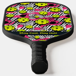 Custom text yellow pickleballs on pink pickleball paddle