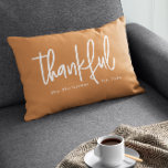 Custom Thankful Thanksgiving Season Autumn Orange Lumbar Cushion<br><div class="desc">Celebrate family and the Thanksgiving season with this Personalised "Thankful" Autumn Orange Lumbar Accent Pillow featuring your family name and established year. Designed in modern white handlettering against a warm autumn orange background, this cosy pillow is perfect for adding a personal touch to your Thanksgiving decor. Ideal for living rooms,...</div>