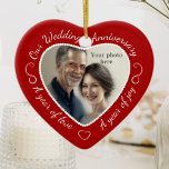 Custom Wedding Anniversary Photo<br><div class="desc">This romantic red and white ornament lets you add your own photo to the heart-shape cutout. Create a special keepsake for your loved one. The red heart frame has white script text that says 'Our Wedding Anniversary' across the top, and 'A year of love', 'A year of joy' along each...</div>