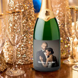 Custom Wedding Bride and Groom's Photo Sparkling Wine Label<br><div class="desc">Toast the bride and groom with sparkling wine that is personalised with a photo of the happy couple. This design has a text template to customise with the bride and groom's names and wedding date as well as a photo template for uploading your desired photo. Personalise as you desire to...</div>