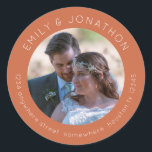 Custom Wedding Photo Return Address Terracotta Classic Round Sticker<br><div class="desc">A modern design with your photo is in the middle, and your names curved above and your return address curved below in cream on a terracotta background. All the text can be easily personalised and simply replace the photo in the template holder with your own. You can also change back...</div>