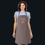 Custom Year Vintage 40th Birthday Limited Edition Apron<br><div class="desc">The Custom Year Vintage 40th Birthday Limited Edition Apron is the perfect way to celebrate a milestone birthday in style. This limited edition apron features a classic and timeless vintage script design, with a bold and prominent year of your choice displayed on the front in groovy boho earth tone letters....</div>