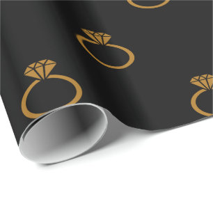 Customisable Matte Gold Engagement Rings on Black Wrapping Paper