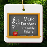 Customise Your Music Teachers  Ceramic Ornament<br><div class="desc">Show your appreciation for the sharpest music teacher around with our customisable "Music Teachers Are Really Sharp" ornament! This charming ornament features a blackboard theme with a treble clef and music notes, making it the perfect holiday gift for the music lover in your life. Personalise it with a name, date,...</div>