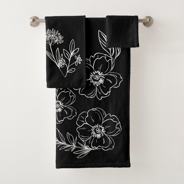 Customizable black towels with white flowers (Insitu)