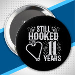Cute 11th Anniversary Couples Married 11 Years 10 Cm Round Badge<br><div class="desc">This fun 11th wedding anniversary design is perfect for fishing couples that have been married for 11 years and are still hooked on each other & love to go fishing! Great for a 11th wedding anniversary party to celebrate 11 years of marriage! Features "Still Hooked After 11 Years" wedding anniversary...</div>