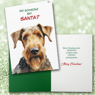Cute Airedale Terrier Dog Looks for Santa Holiday Card