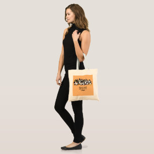 Cute animated penguins background tote bag