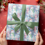 Cute Artsy Funny Christmas Holiday Snowmen Pattern Wrapping Paper<br><div class="desc">Cute,  unique,  classic,  trendy,  pretty and decorative image of a group of smiling snowmen pattern available on a wide variety of stylish,  classy or chic products. This whimsical design is made for kids,  the lover of the December Holiday season or cute graphic art illustrations.</div>