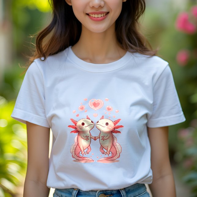Cute Axolotl Love: Holding Hands Women's T-Shirt (a woman wearing a white t-shirt with a cute romantic axolotl couple holding hands)
