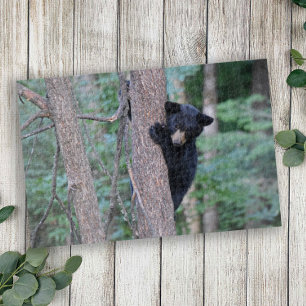 Cute Baby Black Bear Cub Climbing Tree Jigsaw Puzzle