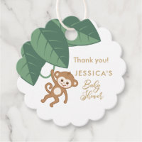 Cute baby monkey hanging from the vine