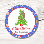 Cute Baby Monkey With Zoo Merry Christmas  Classic Round Sticker<br><div class="desc">This charming design features a cute baby monkey climbing a Christmas tree. The design includes a variety of beloved animals in festive attire,  accented with snowflakes and star trim. Personalise it with your family name for a special touch that adds warmth and joy to the holiday season.</div>