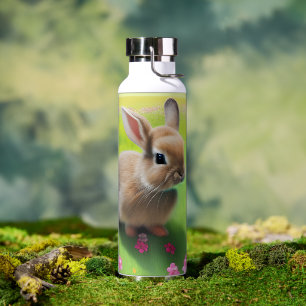 Cute baby rabbit in a flower meadow water bottle