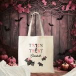 Cute Bats Coquette Bows Trick or Treat Halloween Tote Bag<br><div class="desc">Cute bat trio "Trick or Treat" "Happy Halloween" with a couple of the bats sporting coquette pink bows holiday design in pink,  grey and black.  Composite design by Holiday Hearts Designs.</div>