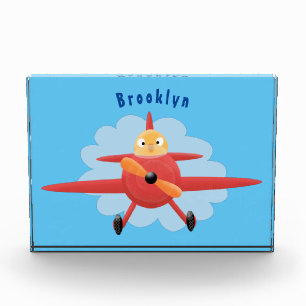 Cute bird flying red aeroplane cartoon illustratio photo block