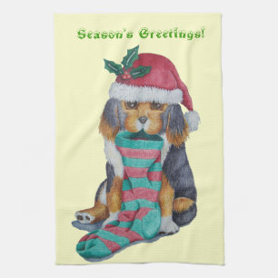 cute black and brown puppy with stocking christmas tea towel