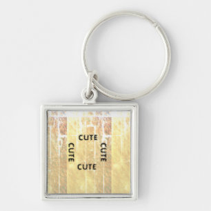 CUTE_ BLACK AND LIGHT YELLOW KEYCHAIN
