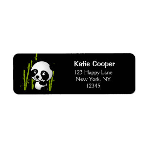 Cute black and white panda bear in a bamboo grove