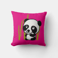 Cute black and white panda bear in a bamboo grove.