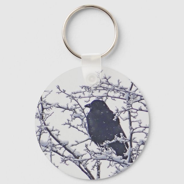 Cute black bird in snowy branches key ring (Front)