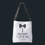 Cute Black Bow Tie & Buttons Groom's Wedding Crossbody Bag<br><div class="desc">These fun bags are designed especially for the groom. They feature an image of a black tie with three buttons and text that reads Groom with a space to enter his name as well as the wedding couple's names and wedding date. Great way to show your thanks for all of...</div>