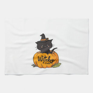 Cute black cat in pumpkin with witch hat, kawaii s tea towel