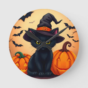 Cute Black Cat in Witch Hat Surrounded by Pumpkins Round Clock